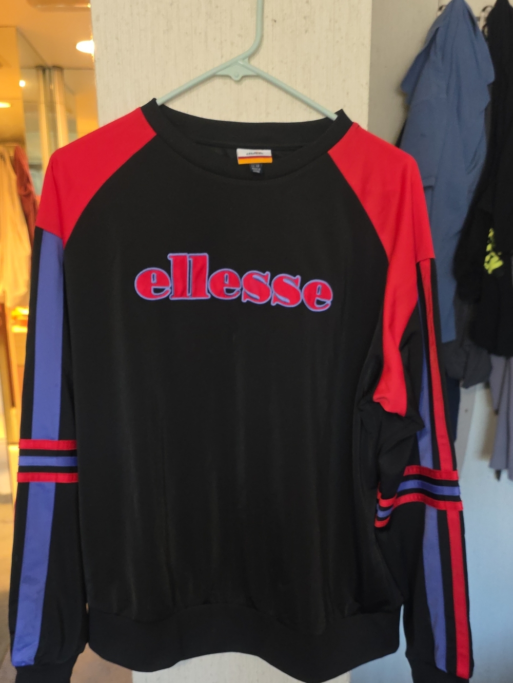 Ellesse Black Sweatshirt with Red and Purple Sleeve Accents